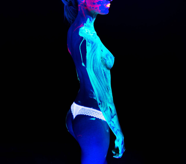 Photo of half-naked young girl in profile in neon - Photo, Image