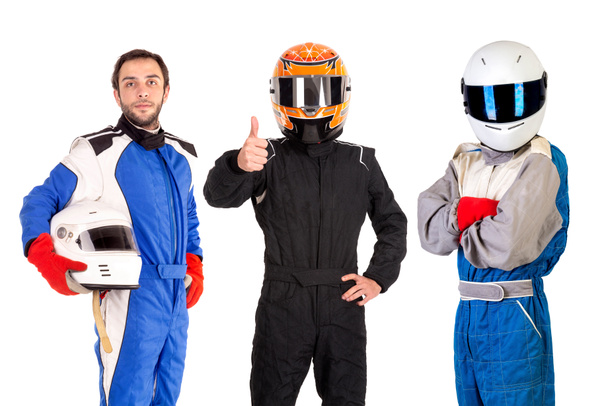 Pilotos de carreras posando con cascos aislados en blanco - Foto, imagen