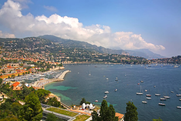 Beautiful view of the French riverira town of Villefranche sur Mer, on the coastline of the mediteranean sea, with a marina, tourist resort, France.  - Photo, Image