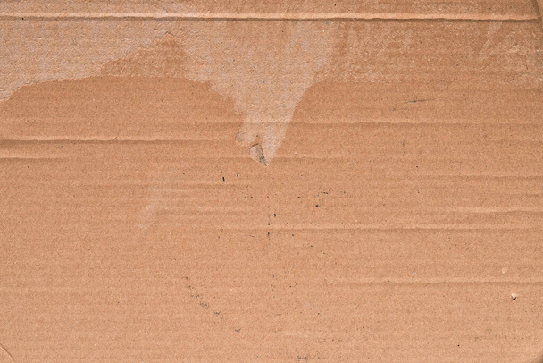 Textur aus Pappe, Oberfläche aus braunem Karton - Foto, Bild