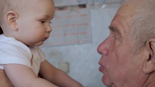 Caucasian Grandfather And Little Baby Play Funny At Home - Кадри, відео