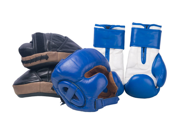 close-up, protective helmet, paws for training and gloves for sports, Boxing, on a white background - Foto, Bild