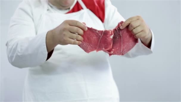 Butcher showing nice cut of beef - Filmati, video