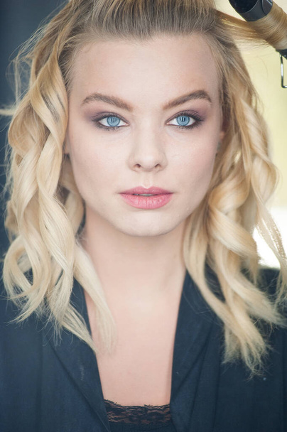 Pretty blonde with blue eyes and wavy hair - Foto, Bild