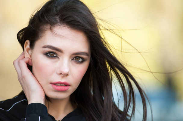 Young beautiful woman in windy weather - Photo, Image