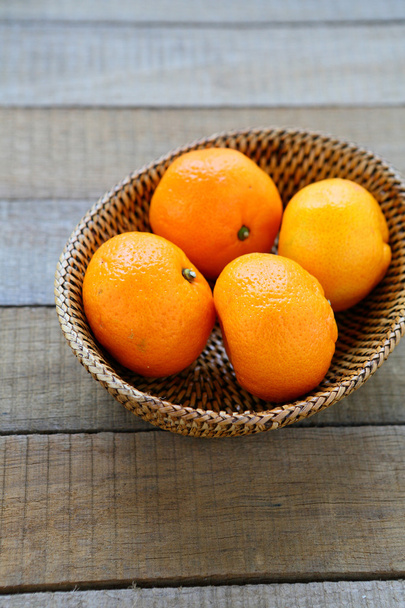 whole tangerines in basket - Photo, Image