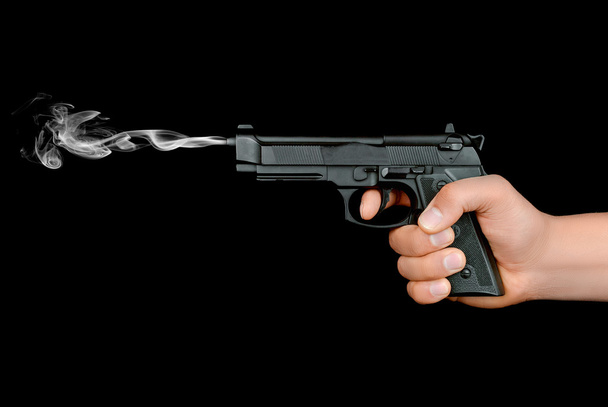 gun in the hand - Foto, afbeelding