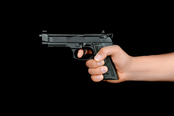 gun in the hand - Φωτογραφία, εικόνα