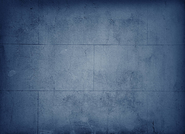 Крупный план синей текстурированной стены
. - Фото, изображение