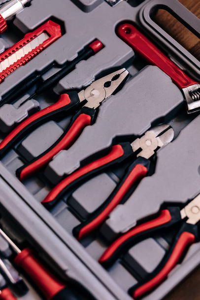 close-up of varieties of pliers. tool box. - Photo, Image