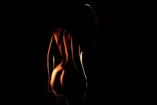 Sexy butt girls in underwear on black background isolated. - Photo, Image