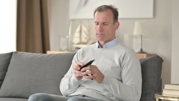 Worried Middle Aged Man Checking Empty Pocket for Money  - Footage, Video