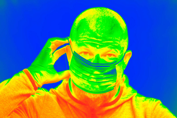 Thermal scanner detecting infected people with Covid-19. Coronavirus spread control concept. - Fotografie, Obrázek