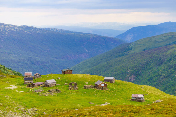 Norwegian old houses hytte, mountains farm. Summer landscape in Norway, Scandinavia - Foto, afbeelding