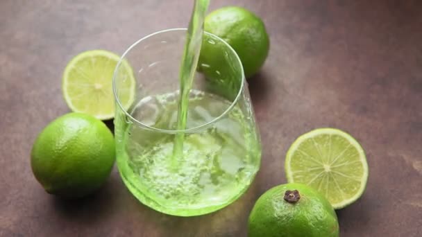 limes juice, lemonade in a glass glass. Healthy lifestyle and detox. - Footage, Video