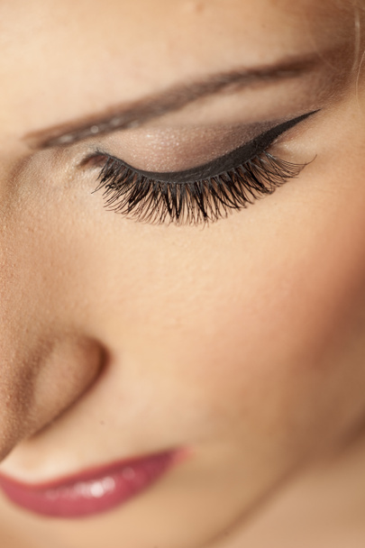 closeup of made-up female eye with artificial eyelashes - Photo, Image