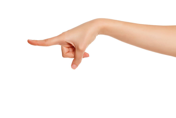dedo índice de mano femenino apuntando sobre fondo blanco
 - Foto, imagen