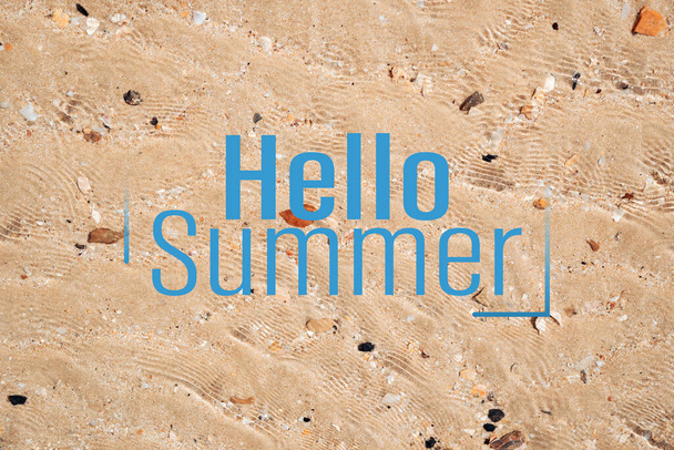 Hello summer words on sand beach texture abstract background. Summer vacation and travel holiday concept. Vintage tone filter effect color style. - Foto, immagini