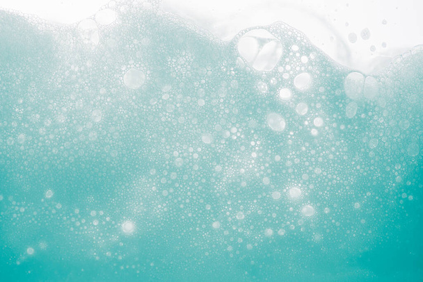 Background of close-up soap or shampoo bubbles on white background. - Photo, Image