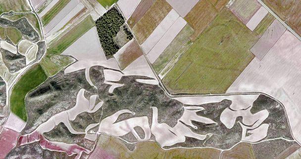 the burrow, tribute to Picasso, abstract photography of the Spain fields from the air, aerial view, representation of human labor camps, abstract art,  - Photo, Image