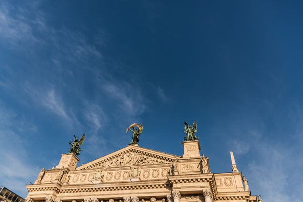 Lviv Theatre of Opera and Ballet in sunlight against blue sky - Photo, Image