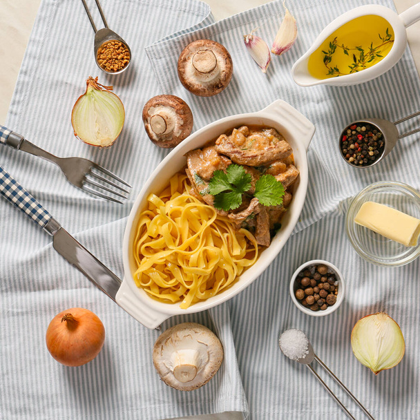 Tasty beef stroganoff with pasta on table - Photo, Image