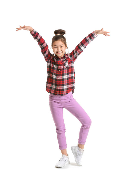 Cute dancing girl on white background - Photo, image
