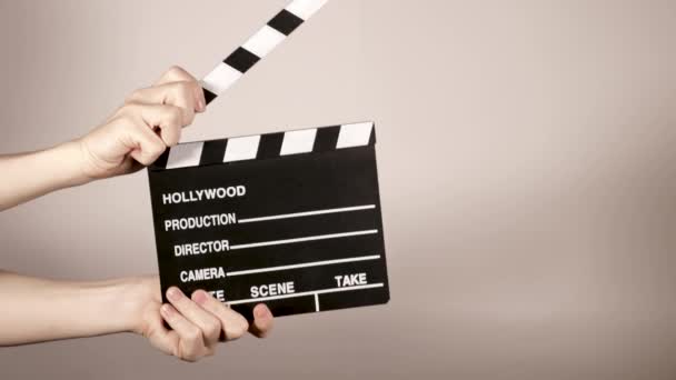 Clapperboard a white background - Footage, Video