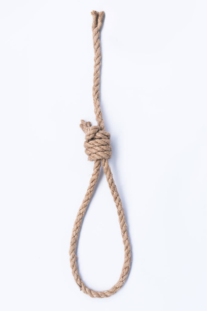 Scaffolds suicide rope on white paper - Photo, Image