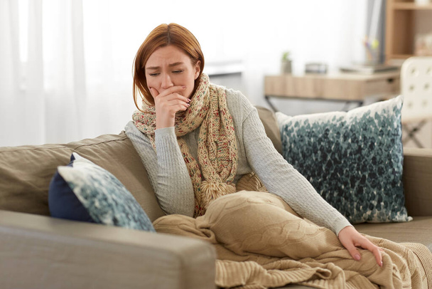 sick woman in scarf coughing at home - Φωτογραφία, εικόνα