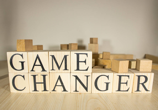 Game changer text on wooden cube blocks. Close up. Consept. - Photo, Image