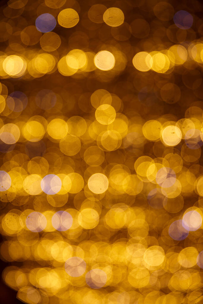 Gouden abstracte bokeh achtergrond. Ronde lichten - Foto, afbeelding