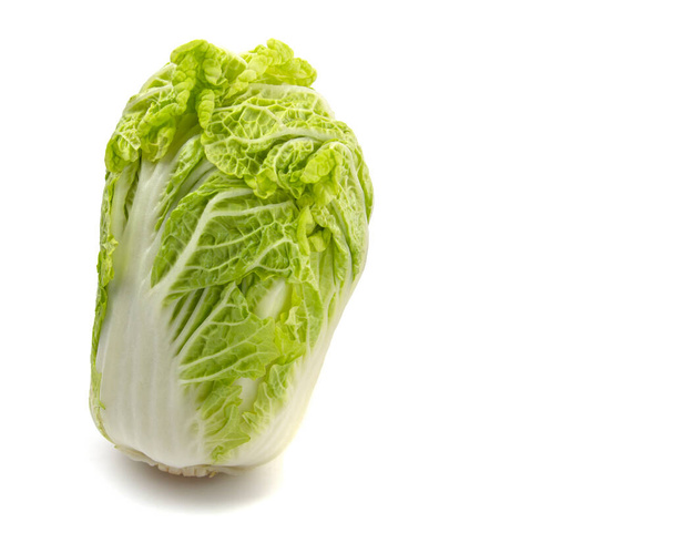 Peking cabbage close-up on a white isolated background, free space, space for text - Фото, изображение