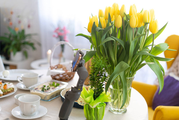 Festive Easter table setting with traditional meals. Easter breakfast in Poland. Christian tradition commemorating the resurrection of Jesus. - 写真・画像