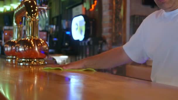 Bartender Cleaning the Bar. - Footage, Video