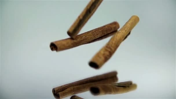 Cinnamon sticks falling and bumping one into another - Footage, Video