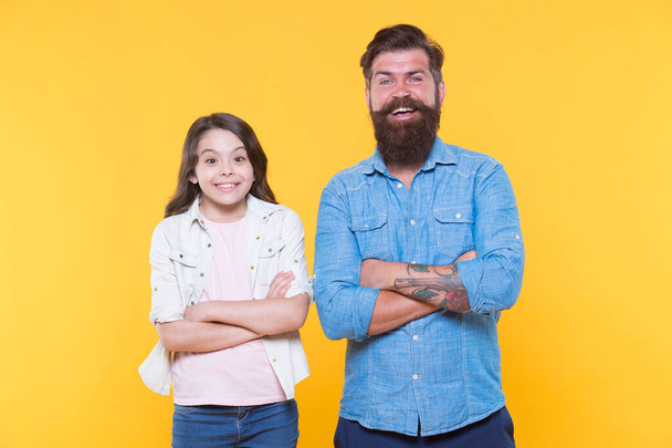 Together we make family. Happy family yellow bacckground. Father and daughter. Bearded man and child. Adoptive family. Love and trust. Family values. Together is our favorite place to be - Fotoğraf, Görsel