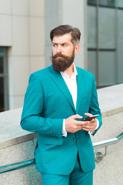 Audio message service. Text messaging. Mobile communication. Email message. Talent of managing. Online business. Bearded man with smartphone. Businessman send sms using smartphone. Send message - Photo, image