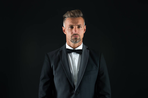 handsome tuxedo man. formal and business fashion. groomed male on special event. its wedding day. stylish art director. real esthete in all details. being real gentleman. wear bow tie - Photo, Image