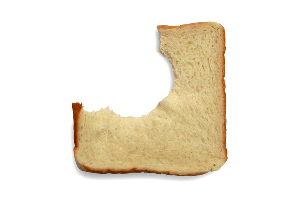 Pala leipää, joka on purtu eristetty valkoisella pohjalla. - Valokuva, kuva