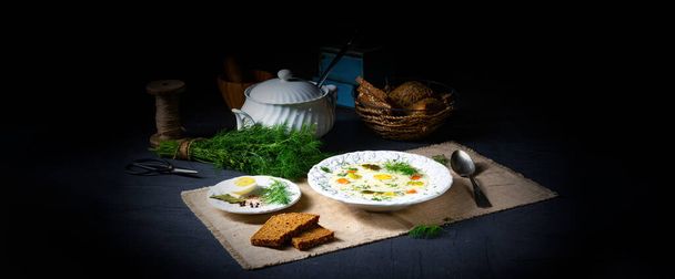 Dill soup with potato, fresh dill and egg - 写真・画像