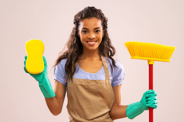 Portrait of happy and successful african-american professional maid. - Foto, Imagem