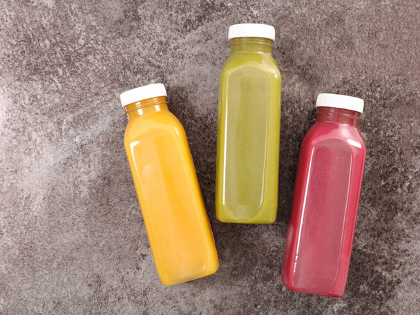 bottle of fruit juice- top view - Zdjęcie, obraz