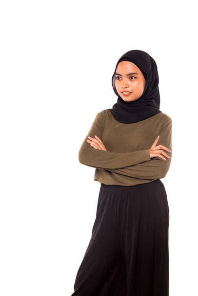 Casual Hijab Fashion.Cute Muslim girl with casual dress and hijab isolated over white background. - Foto, Imagem