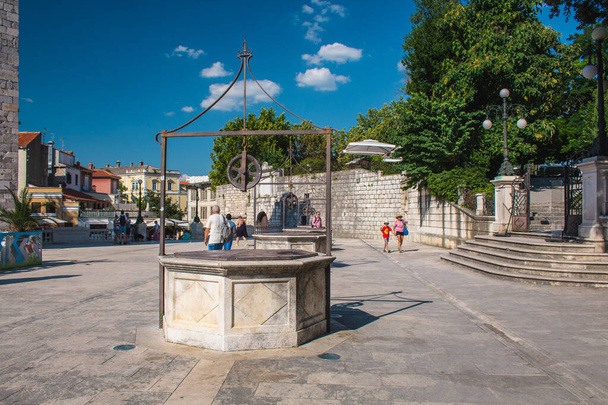 Zadar, Croatia - July 24 2018: Five Wells Square in the old town of Zadar. They were once build to provide people of the city with water - Zdjęcie, obraz