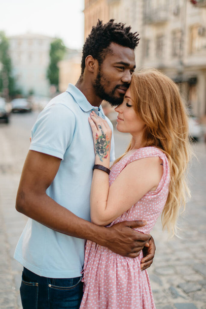 Interracial couple in the city. - Valokuva, kuva
