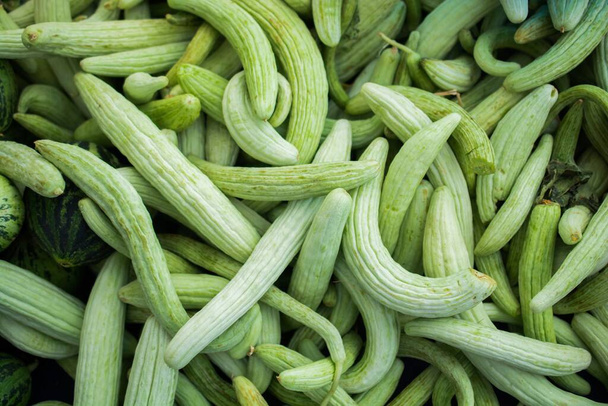 A closeup view of green vegetables together in a box - Photo, image