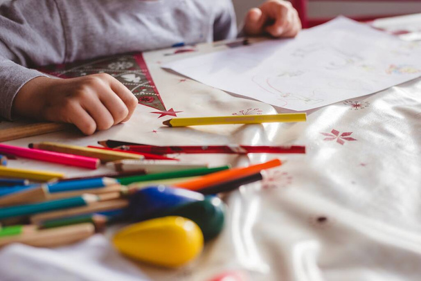 The child drawing with colorful pencils - Fotografie, Obrázek