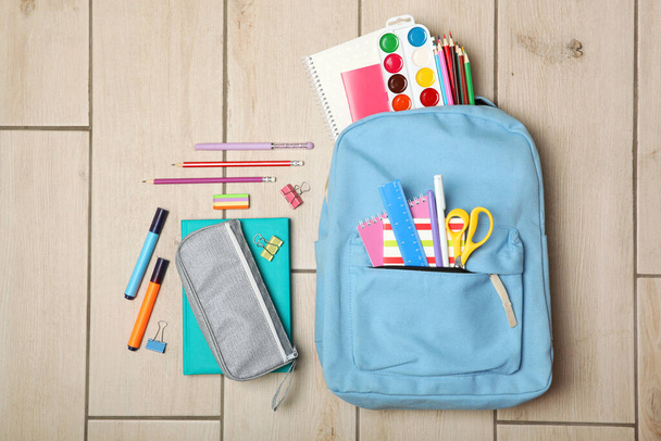 school backpack and school stationery top view. Concept back to school. - Fotó, kép