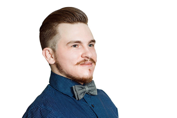 Young man with pompadour haircut, dressed in blue shirt with a serious face. real photo hair for barbershop, isolated. - Foto, afbeelding